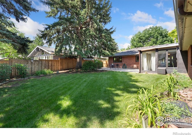 600 Monte Vista Ave, Fort Collins, CO 80521 - fenced backyard with a patio area