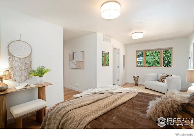 600 Monte Vista Ave, Fort Collins, CO 80521 - bedroom featuring baseboards and wood finished floors