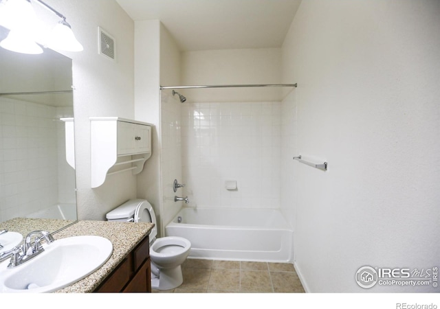 3155 Blue Sky Cir Unit 16-103, Erie, CO 80516 - full bath featuring vanity, washtub / shower combination, and tile patterned floors
