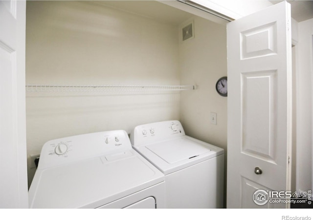 3155 Blue Sky Cir Unit 16-103, Erie, CO 80516 - laundry area featuring washer and clothes dryer