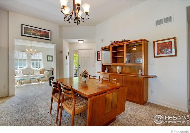 8305 E 149th Dr, Thornton, CO 80602 - dining space with a chandelier and light colored carpet