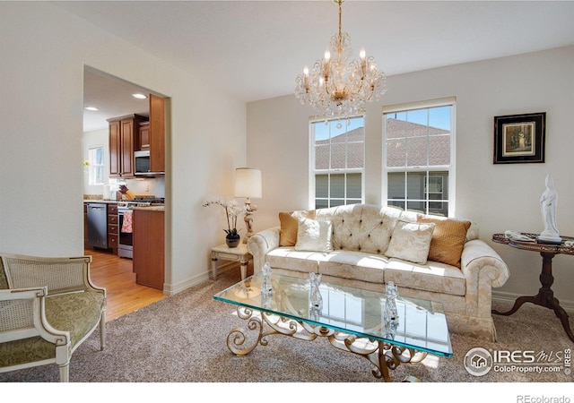 8305 E 149th Dr, Thornton, CO 80602 - living room with light carpet and a chandelier