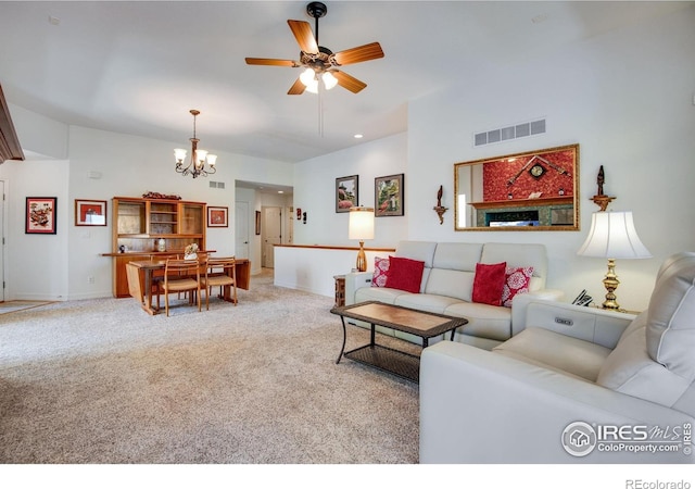 8305 E 149th Dr, Thornton, CO 80602 - carpeted living area with a chandelier and ceiling fan