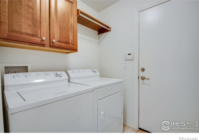 8305 E 149th Dr, Thornton, CO 80602 - laundry room featuring washing machine and dryer and cabinet space