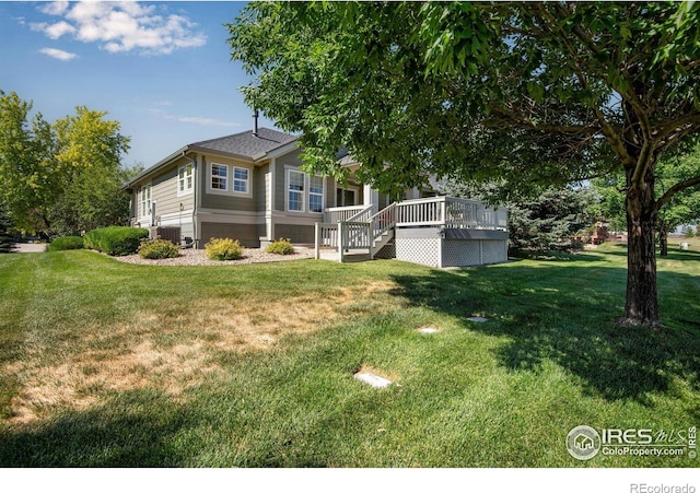8305 E 149th Dr, Thornton, CO 80602 - view of front facade with a front lawn, stairs, and a deck