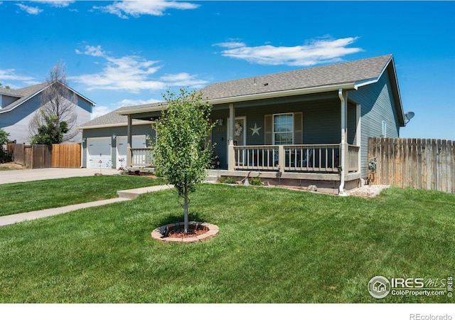 4521 Mesa Verde Dr, Greeley, CO 80634 - single story home with a porch, driveway, and a garage