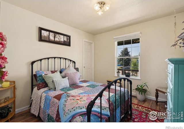 4521 Mesa Verde Dr, Greeley, CO 80634 - bedroom with wood finished floors and baseboards