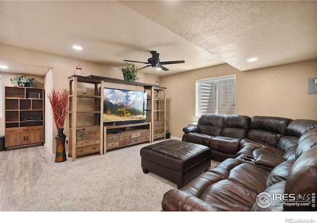 4521 Mesa Verde Dr, Greeley, CO 80634 - living area featuring a ceiling fan, a textured ceiling, recessed lighting, and wood finished floors
