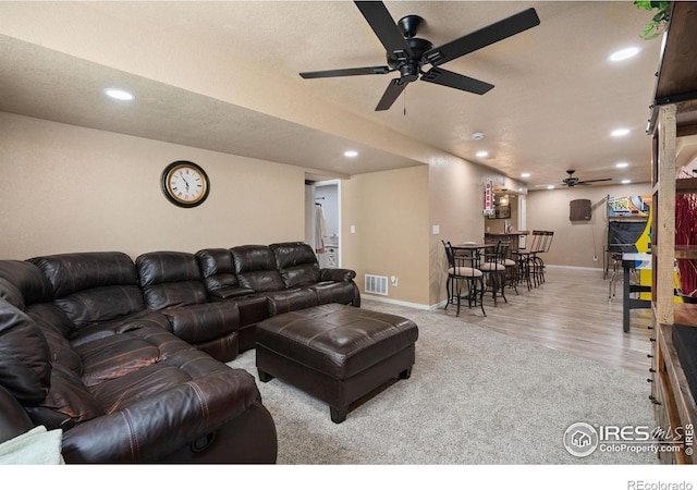 4521 Mesa Verde Dr, Greeley, CO 80634 - living room with ceiling fan, recessed lighting, carpet, and wood finished floors
