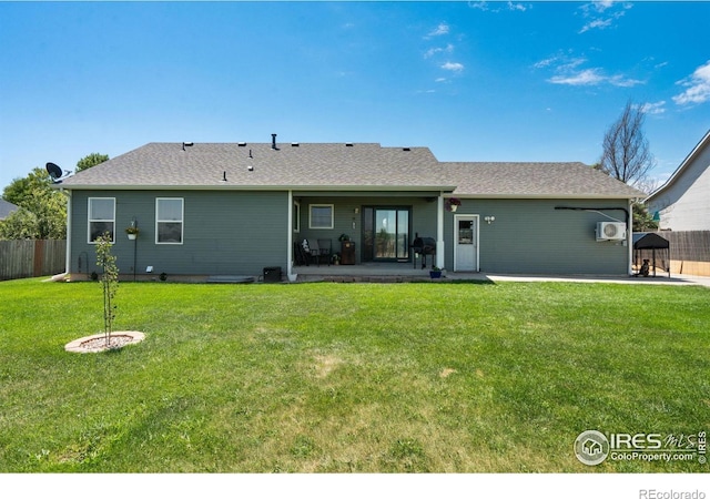 4521 Mesa Verde Dr, Greeley, CO 80634 - rear view of property featuring a patio and a shingled roof