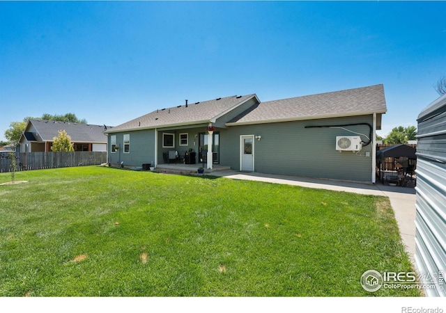 4521 Mesa Verde Dr, Greeley, CO 80634 - rear view of house with a patio area and an AC wall unit