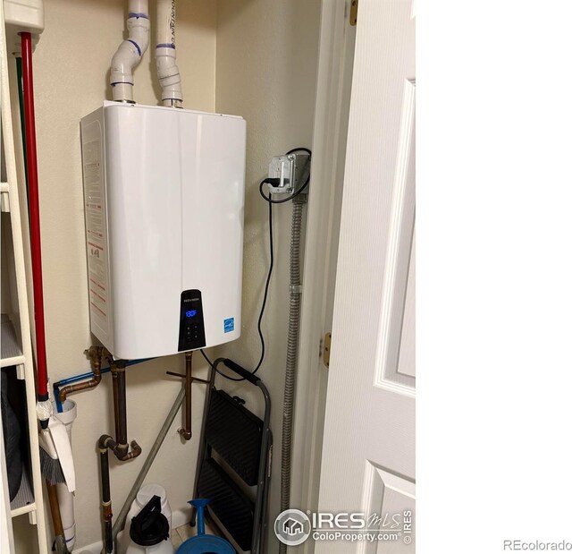 13600 Elmore Rd, Longmont, CO 80504 - utility room with tankless water heater