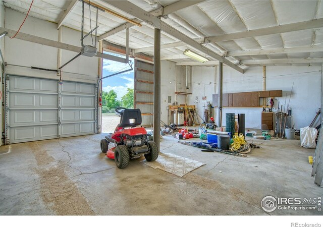 13600 Elmore Rd, Longmont, CO 80504 - garage with a garage door opener