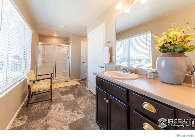 1773 Nightfall Dr, Windsor, CO 80550 - bathroom with a shower stall and vanity