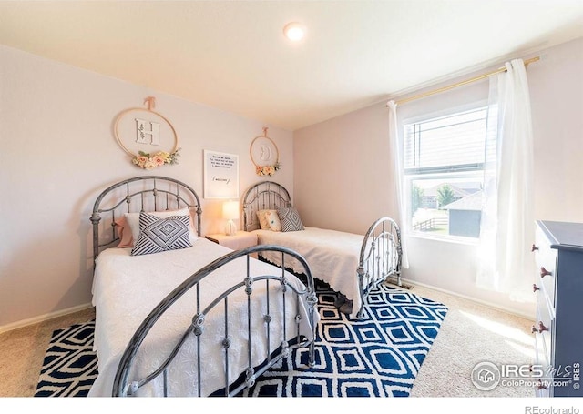 1773 Nightfall Dr, Windsor, CO 80550 - bedroom featuring carpet and baseboards