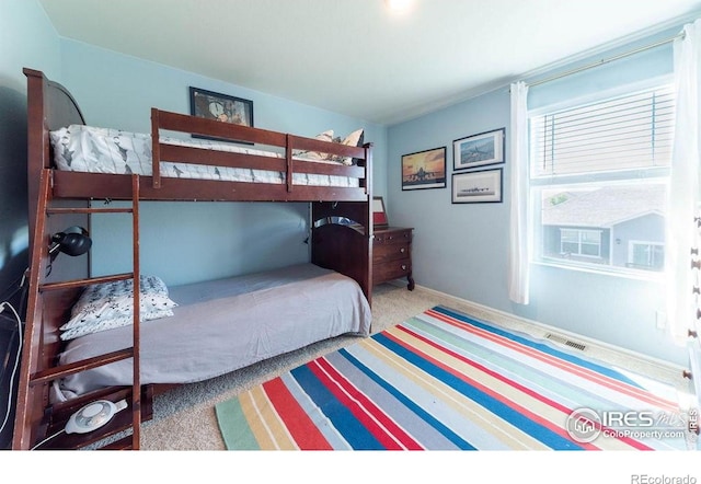 1773 Nightfall Dr, Windsor, CO 80550 - carpeted bedroom with baseboards