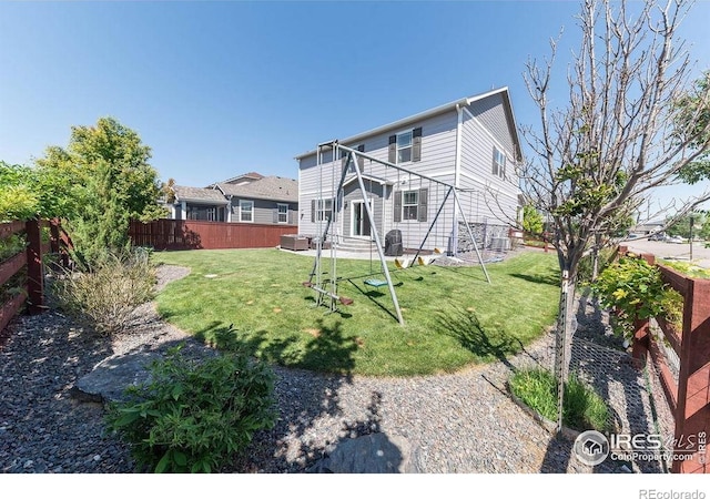 1773 Nightfall Dr, Windsor, CO 80550 - back of house with a fenced backyard