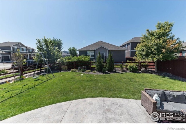 1773 Nightfall Dr, Windsor, CO 80550 - fenced backyard featuring a patio area