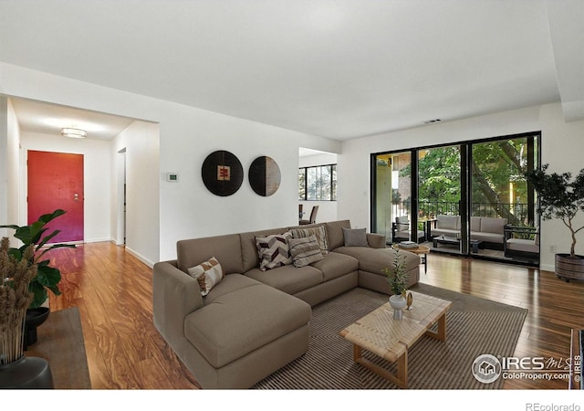 600 Manhattan Dr Unit B7, Boulder, CO 80303 - living room featuring wood finished floors and baseboards