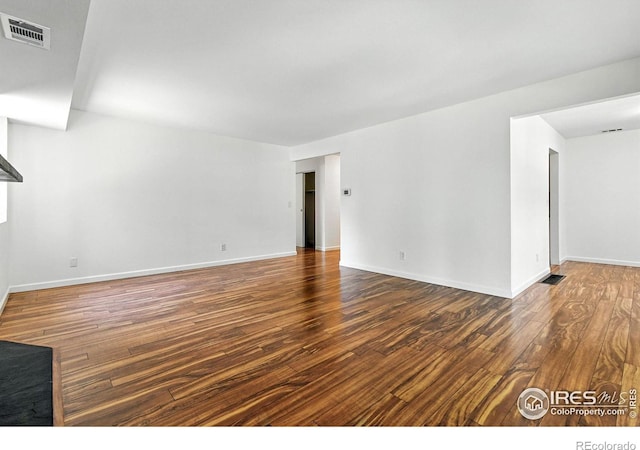 600 Manhattan Dr Unit B7, Boulder, CO 80303 - unfurnished living room with wood finished floors