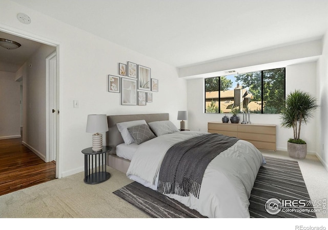 600 Manhattan Dr Unit B7, Boulder, CO 80303 - carpeted bedroom featuring baseboards