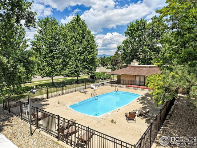 600 Manhattan Dr Unit B7, Boulder, CO 80303 - community pool featuring a patio