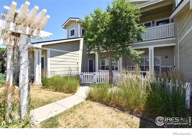 3641 29th St Unit 6, Greeley, CO 80634 - view of front facade featuring a balcony