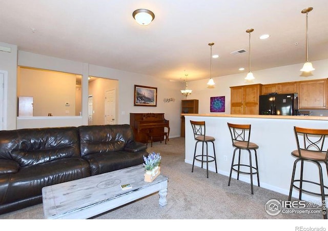 3641 29th St Unit 6, Greeley, CO 80634 - living area featuring light colored carpet and recessed lighting