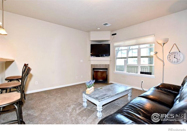 3641 29th St Unit 6, Greeley, CO 80634 - living area featuring carpet flooring and a fireplace