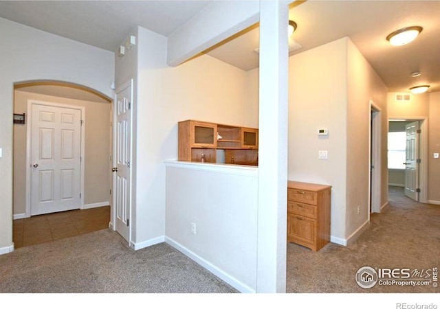 3641 29th St Unit 6, Greeley, CO 80634 - hallway featuring carpet flooring and arched walkways