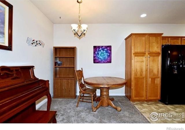 3641 29th St Unit 6, Greeley, CO 80634 - dining room featuring a chandelier and recessed lighting