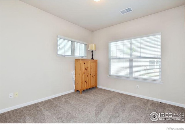 3641 29th St Unit 6, Greeley, CO 80634 - unfurnished room featuring baseboards and carpet