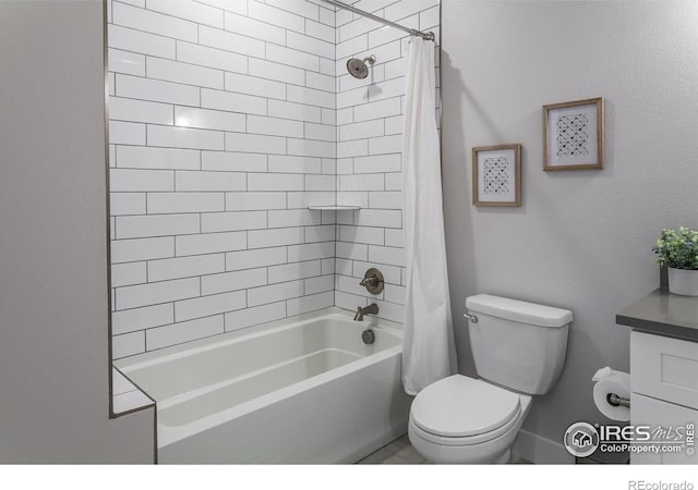 2402 49th Avenue Ct Unit 17, Greeley, CO 80634 - bathroom featuring shower / tub combo with curtain and toilet