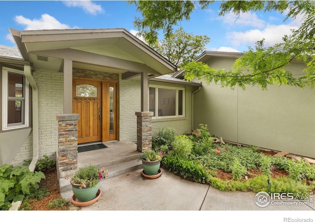 10947 Lynne Ave, Lafayette, CO 80026 - property entrance with brick siding