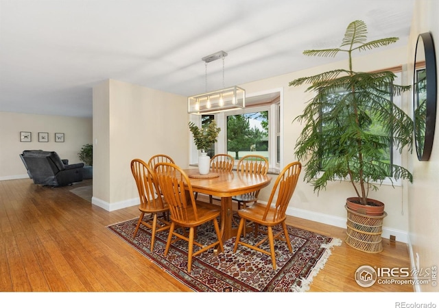 10947 Lynne Ave, Lafayette, CO 80026 - dining area with light wood finished floors and baseboards