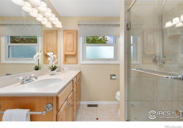 10947 Lynne Ave, Lafayette, CO 80026 - full bath featuring double vanity, a stall shower, and tile patterned flooring