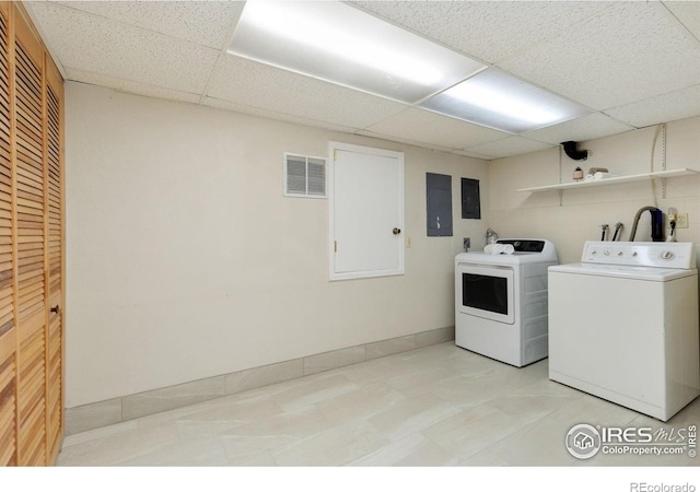 10947 Lynne Ave, Lafayette, CO 80026 - laundry room featuring washer and clothes dryer and electric panel