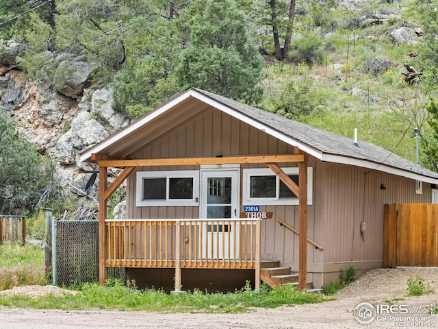 2301 US Highway 34, Drake, CO 80515 - view of front of home with a wooden deck and a shingled roof