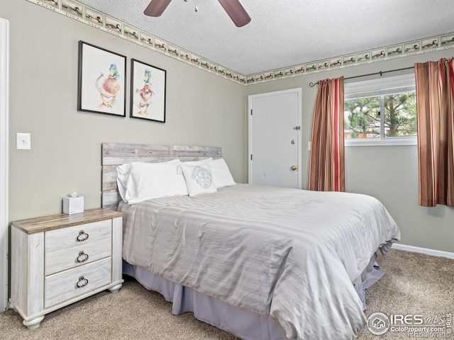 2301 US Highway 34, Drake, CO 80515 - bedroom with light colored carpet, a textured ceiling, and a ceiling fan