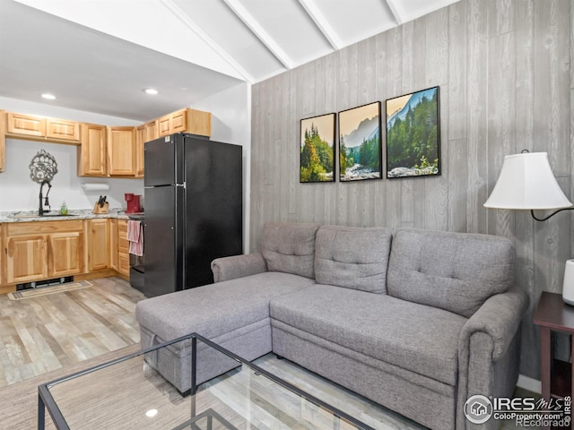 2301 US Highway 34, Drake, CO 80515 - living area with wood walls, light wood-type flooring, lofted ceiling, and recessed lighting