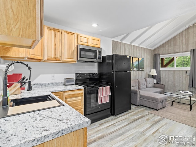 2301 US Highway 34, Drake, CO 80515 - kitchen featuring black appliances, light brown cabinetry, light countertops, light wood finished floors, and lofted ceiling