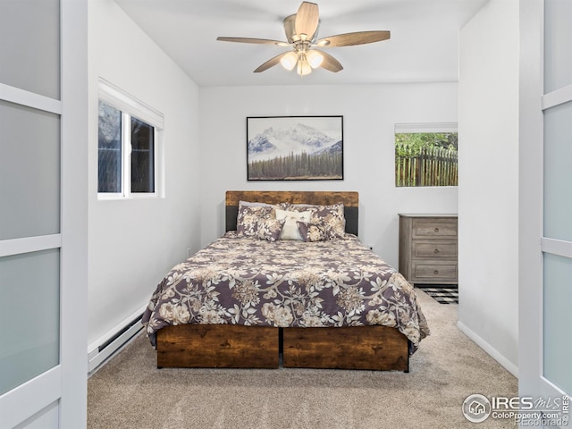 2301 US Highway 34, Drake, CO 80515 - carpeted bedroom with a baseboard radiator and ceiling fan