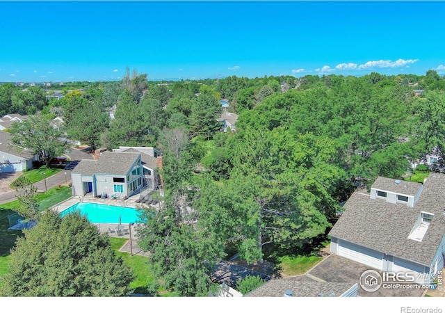 1925 28th Ave Unit 30, Greeley, CO 80634 - view from above of property with a pool and a forest