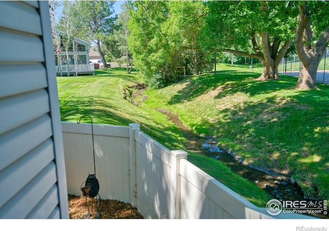 1925 28th Ave Unit 30, Greeley, CO 80634 - view of yard with view of wooded area