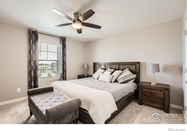 1591 Sun River Rd, Berthoud, CO 80513 - bedroom featuring light colored carpet and a ceiling fan