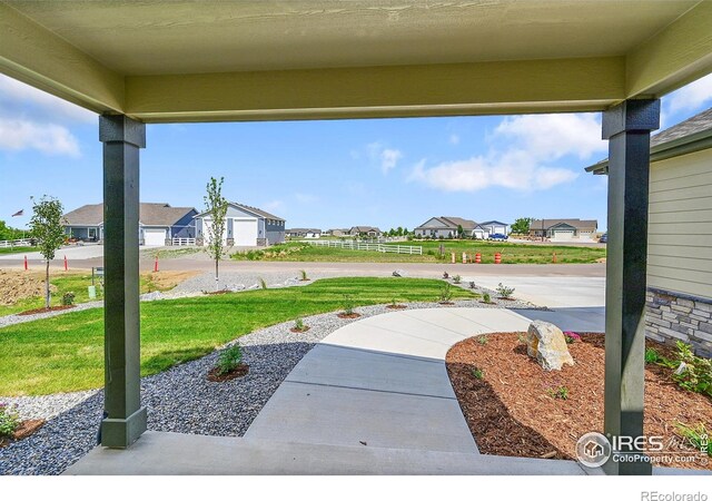3643 Crested Owl Ct, Dacono, CO 80514 - view of patio / terrace with a residential view
