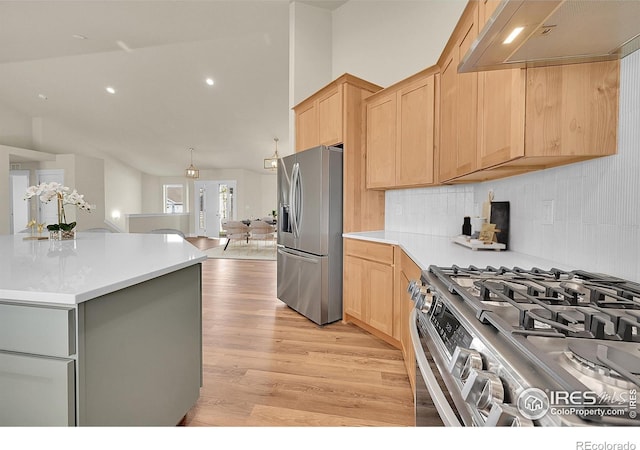 3643 Crested Owl Ct, Dacono, CO 80514 - kitchen featuring appliances with stainless steel finishes, ventilation hood, light brown cabinets, light wood finished floors, and recessed lighting