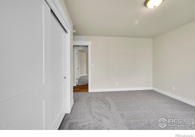 3643 Crested Owl Ct, Dacono, CO 80514 - unfurnished room featuring carpet and baseboards
