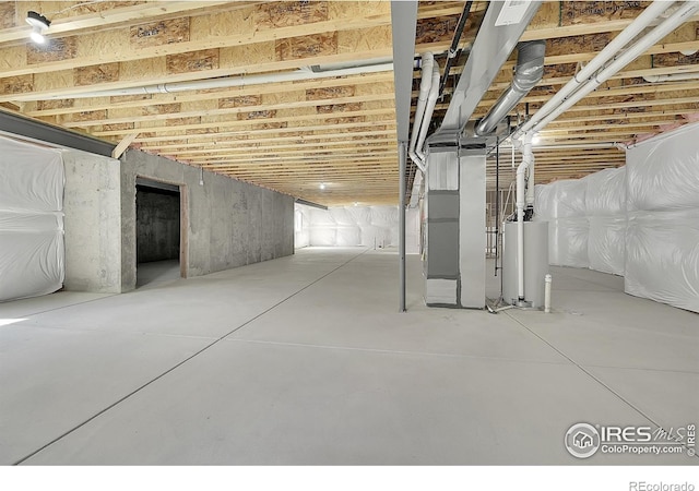 3643 Crested Owl Ct, Dacono, CO 80514 - unfinished below grade area featuring gas water heater and heating unit