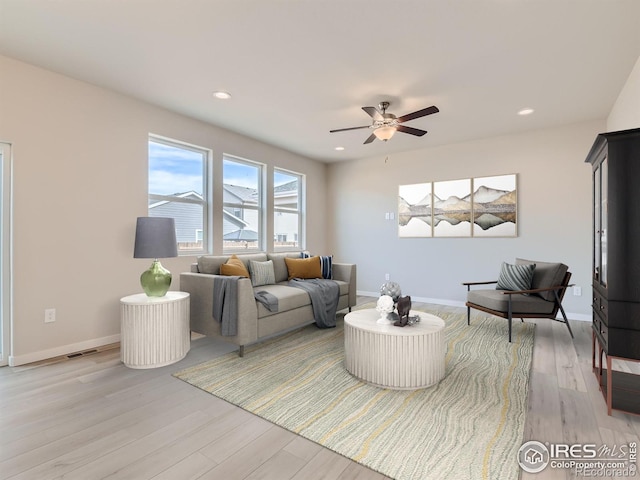 13 Chipeta Way, Lochbuie, CO 80603 - living room featuring light wood-type flooring, ceiling fan, and recessed lighting
